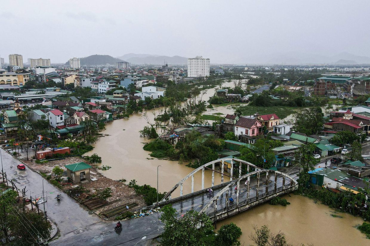 An aerial photo shows a general view after typhoon Bualoi's passage in Nghe An province on Monday, September 29, 2025. A severe storm that ripped roofs off homes has killed dozens of people across Vietnam and the Philippines, officials from both countries said on September 29, as weakened Bualoi crossed into neighbouring Laos. -- Photo by Thai An / AFP