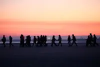 Britain may toughen rules for migrants seeking permanent residency