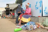 In Nairobi, those living in the slum exchange plastic for water