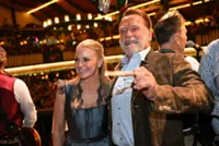 Arnold Schwarzenegger takes up conductor's baton at Oktoberfest