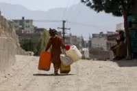 Kabul's wells run dry, driving children out of class and into water queues