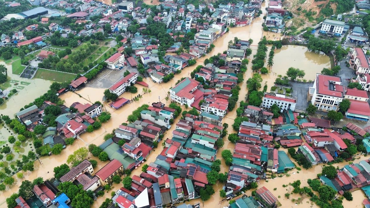 This aerial image shows flooding caused by rain following typhoon Bualoi in Lao Cai, Vietnam, Tuesday, Sept. 30, 2025. - Photo: VNA via AP