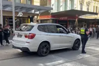 Four held after high-speed car chase through Australia's Melbourne