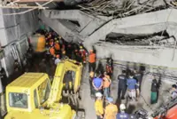 Indonesia rescuers hunt for 38 feared trapped after school collapse kills 3
