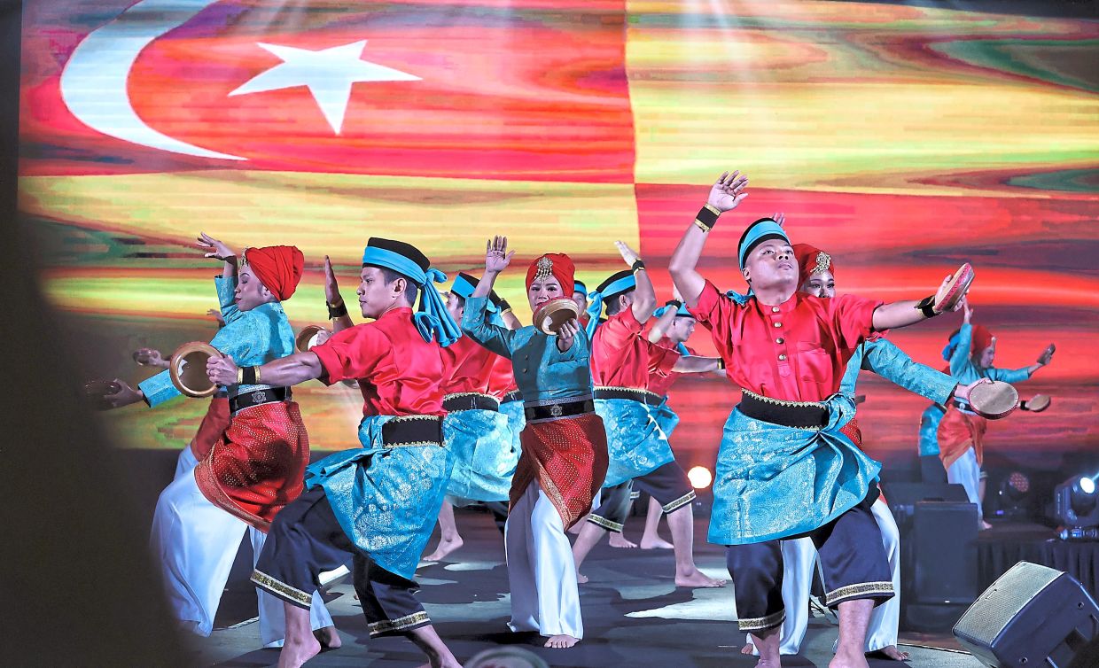 SCEE25 included colourful cultural performances during the launch (above) and exhibitions of local products such as interactive games (right) and handicraft (far right).