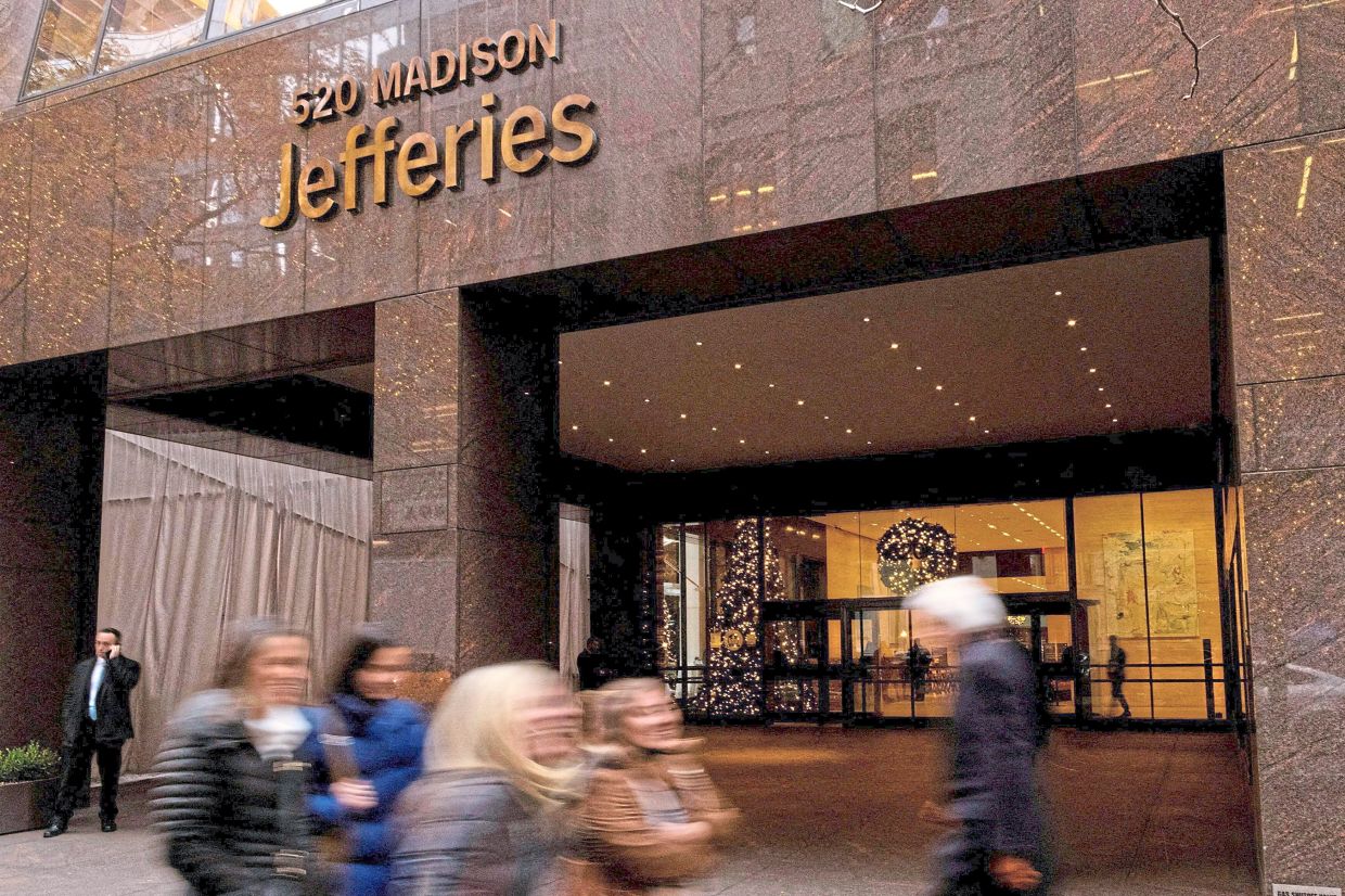 Jefferies posts record revenue on dealmaking | The Star