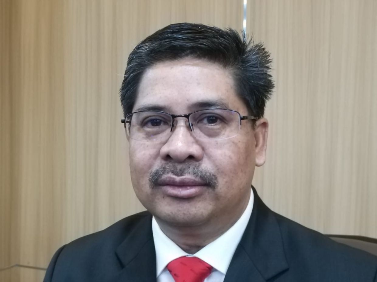 Hasrin Kamal says people are also abandoning their vehicles in the back lanes.