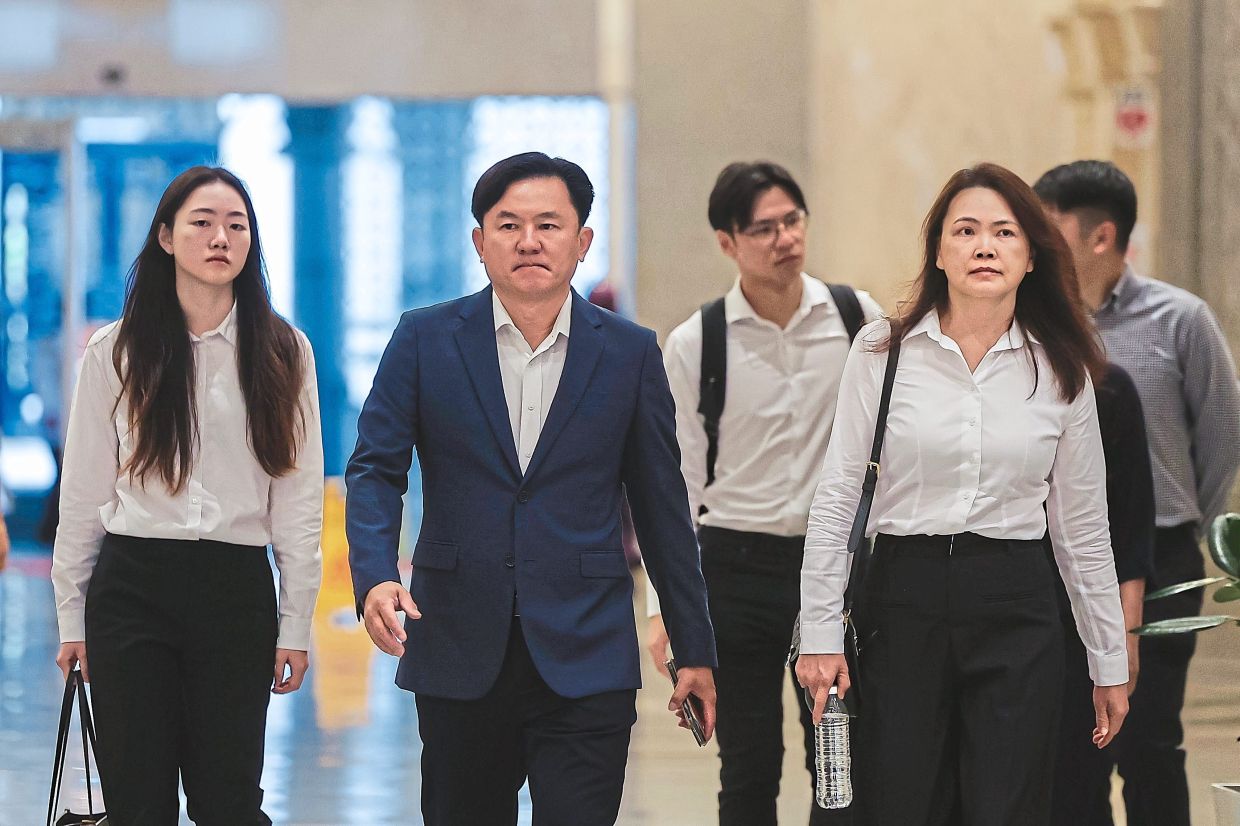 Final decision: Yong (centre) will begin serving his eight-year sentence at Kajang Prison, following the Federal Court’s decision to uphold his rape conviction. — Bernama