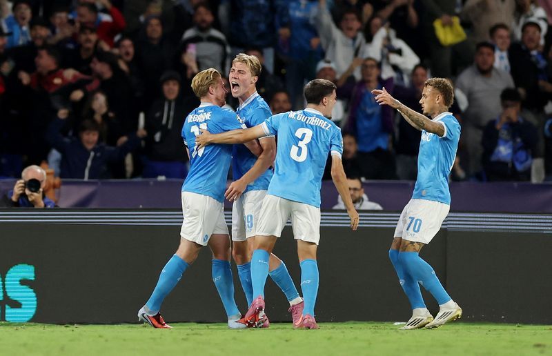 Soccer-Napoli's Hojlund nets double in 2-1 win over Sporting