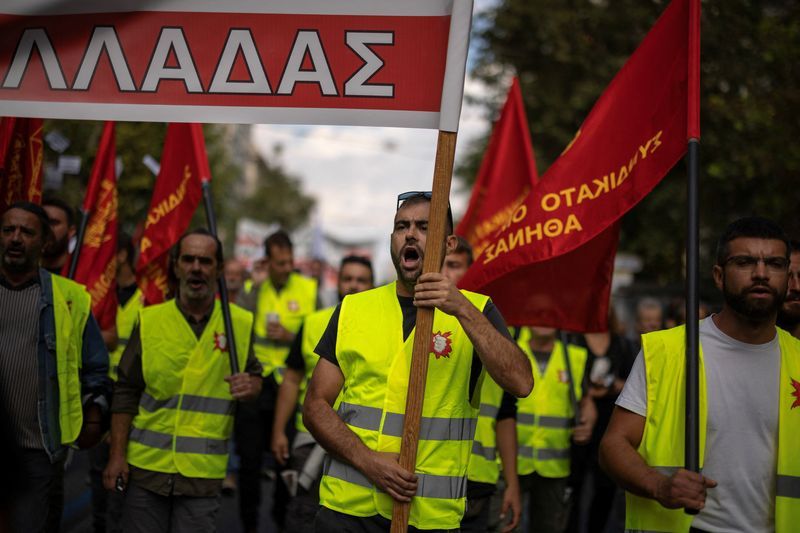 Greek ferries and trains halted as thousands protest over working hours