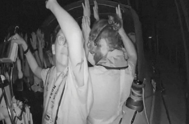 A screengrab from a live footage video shows crew of a Gaza-bound vessel, part of the Global Sumud Flotilla, put their hands up as they are intercepted by Israeli security forces, in this screengrab from a video released on Oct 1. -Reuterspic