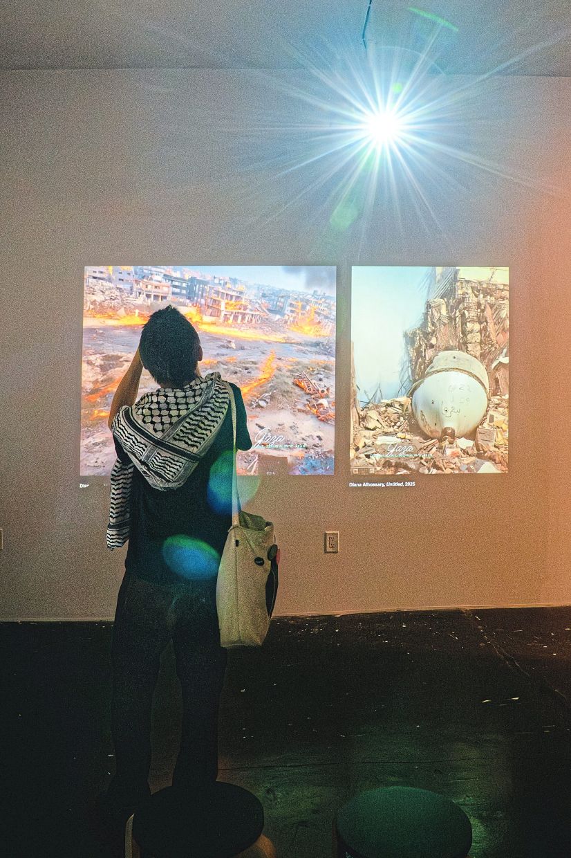 A visitor studies the work of Diana Alhossary on display at the Gaza Biennale art event in New York last month. Photo: The New York Times/Shuran Huang