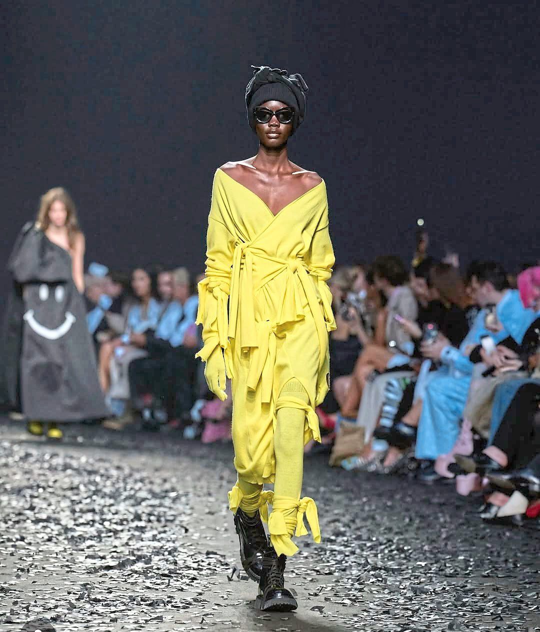 This Italian label is knot afraid to make a statement, as it sends out an outfit covered in knots, worked into ties all over. Photo: Instagram/Moschino