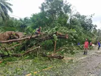 Tropical storm edges toward the Philippines and may grow to a typhoon on path toward China
