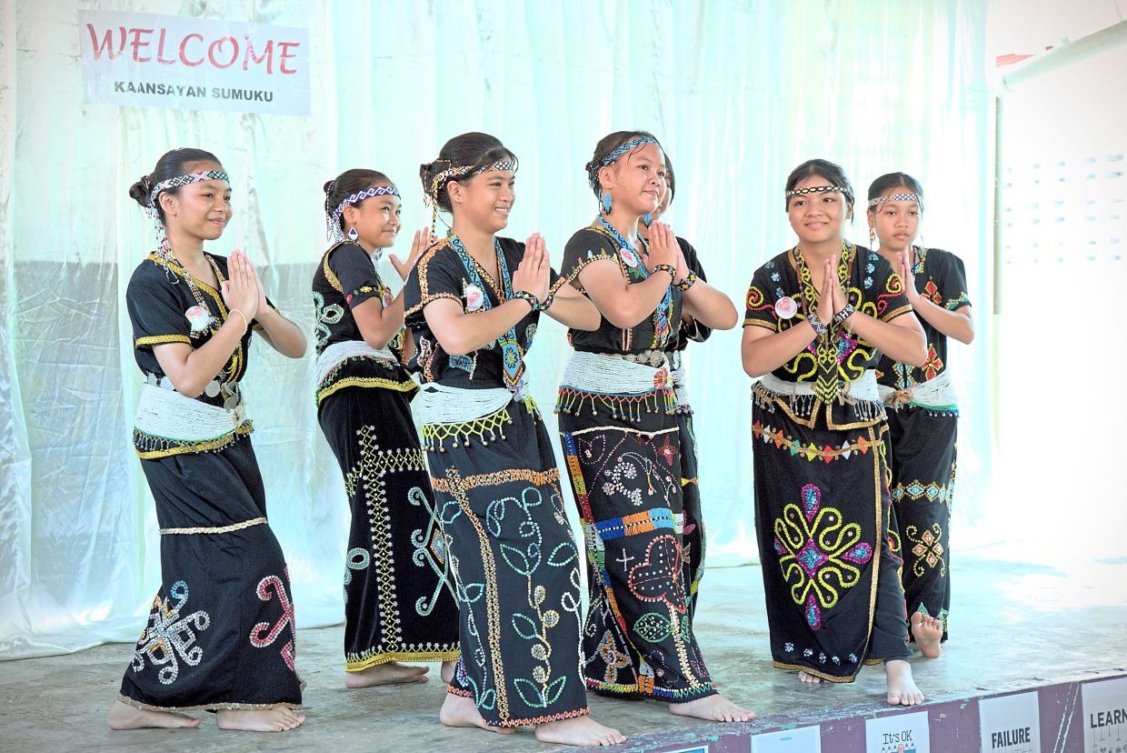 Pupils performing a traditional Murut dance during the programme.