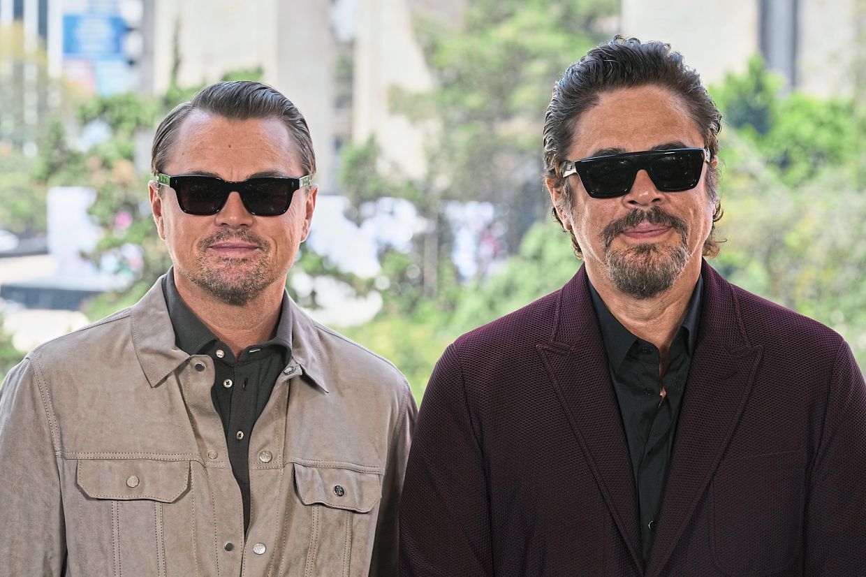 Leonardo DiCaprio, and Benicio Del Toro, pose during a photo call for the film 'One Battle After Another' in Mexico City, Thursday, Sept. 18, 2025. — AP
