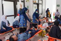 Indonesia halts operations of free meals kitchens following food poisoning incidents