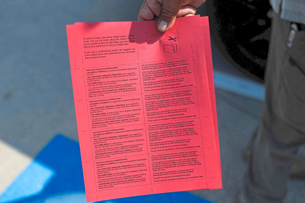 A flyer Mendoza distributes to the immigrant community. — AFP