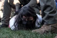 Police scuffle with protesters outside Chicago ICE facility, arrest several