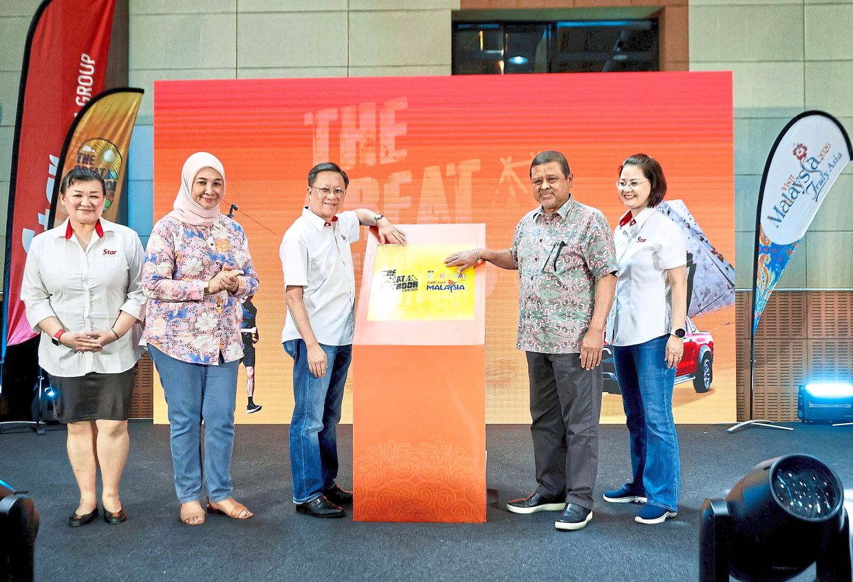 所有笑容：Manoharan（右第二）和Chan（Center）在TGO 2025的推出时。 -  Faihan Ghani和Raja Faisal Hishan/The Star