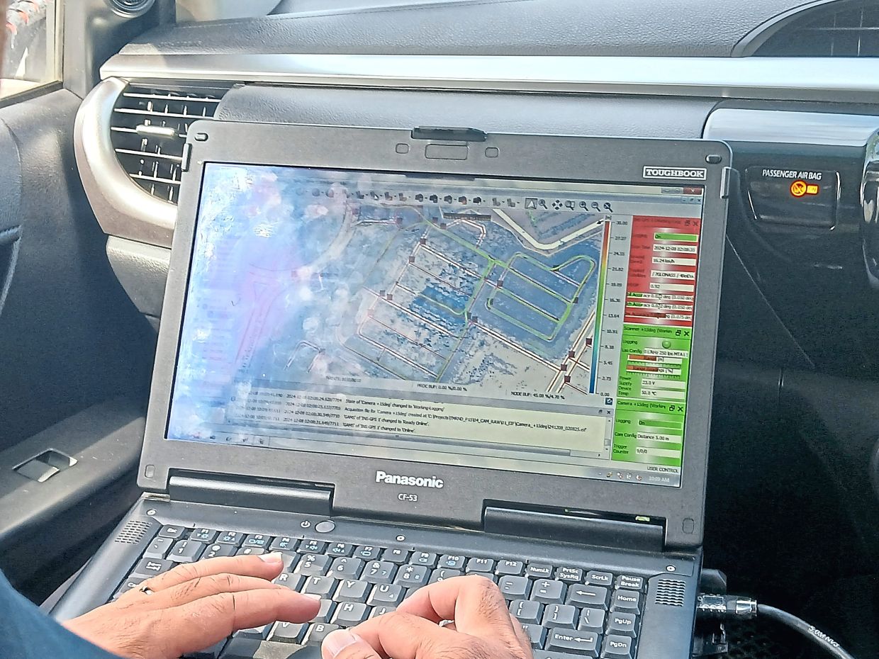 Of tech and arboriculture: How digital tools are revolutionising tree maintenance in Malaysian cities 5 A screen showing live lidar mapping of urban tree areas, with highlighted zones marking completed scans. — TM