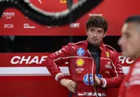 Motor racing-Ferrari's Leclerc struggles with 'unpredictable' car