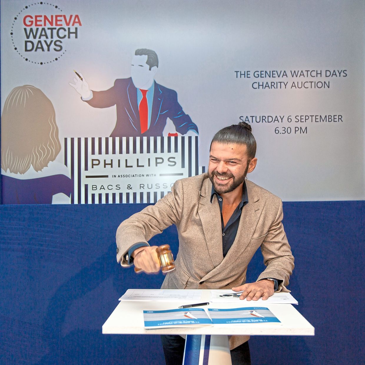 The charity auction was a runaway success.