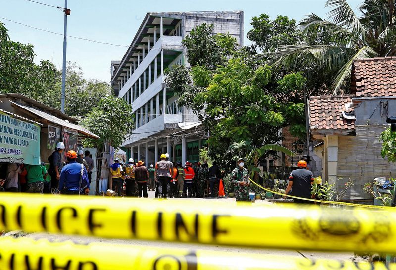 Death toll from Indonesian school collapse jumps to at least 49