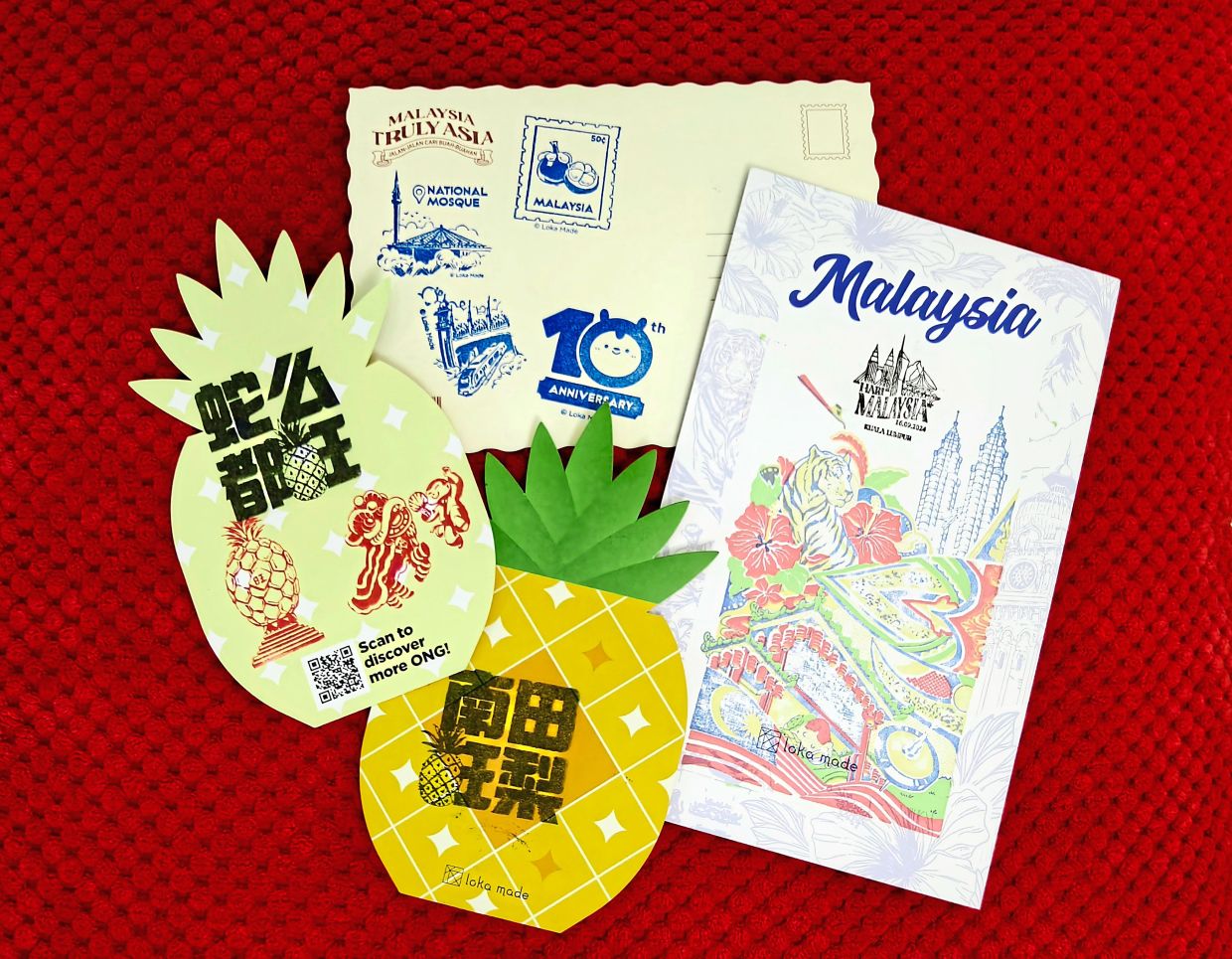 Some of Loh’s postcards are stamped with event-exclusive designs. — JEREMY LOH