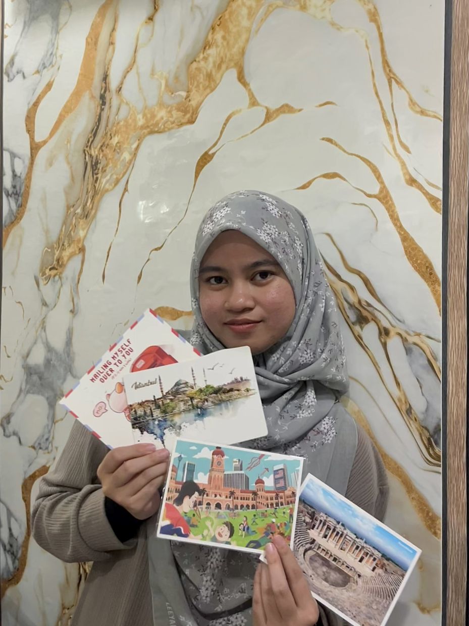 Fatin enjoys sending postcards to friends as well as herself. — FATIN SYAHIDA SAHARUDIN