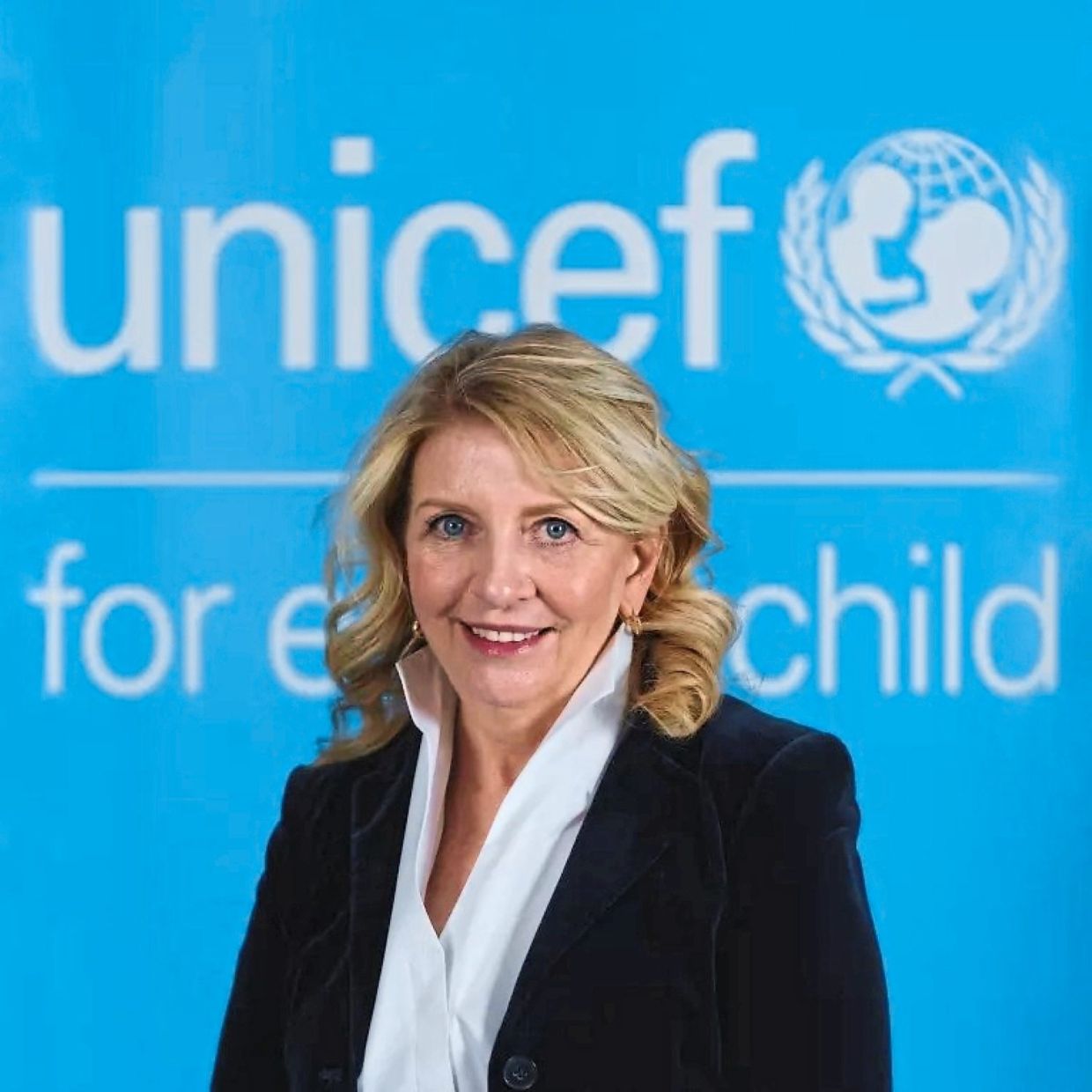 Russell says TXT's message of empathy and resilience creates more space for mental health conversations. Photo: Unicef