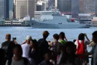 Crowds gather at Hong Kong’s Victoria Harbour to bid farewell to PLA Navy ships