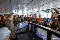 North Korea's Kim visits destroyer built to 'punish provocations'