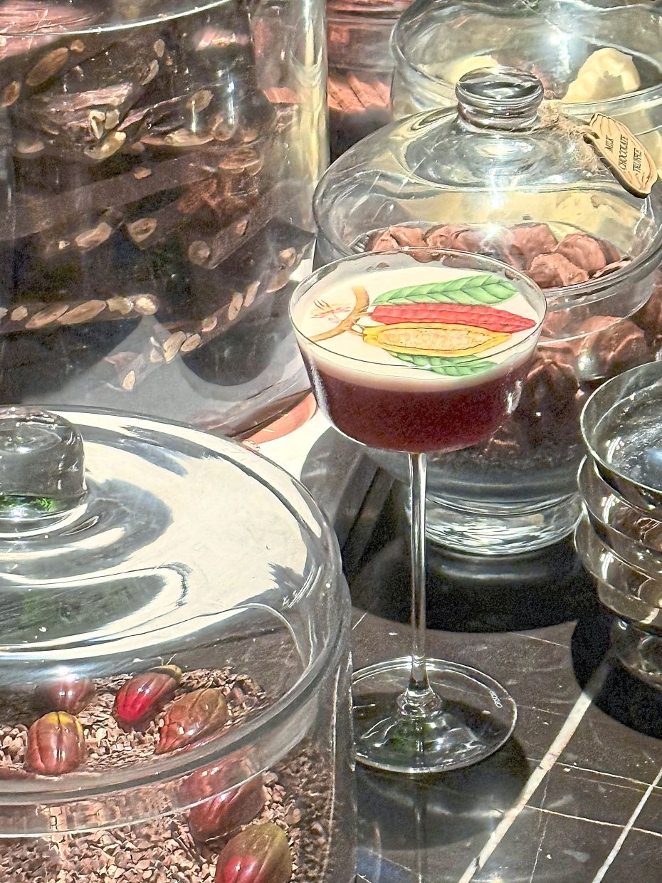 The Cacao Club is a twist of the classic Clover Club cocktail, and is one of the signature drinks at Cacao Mixology And Chocolate.