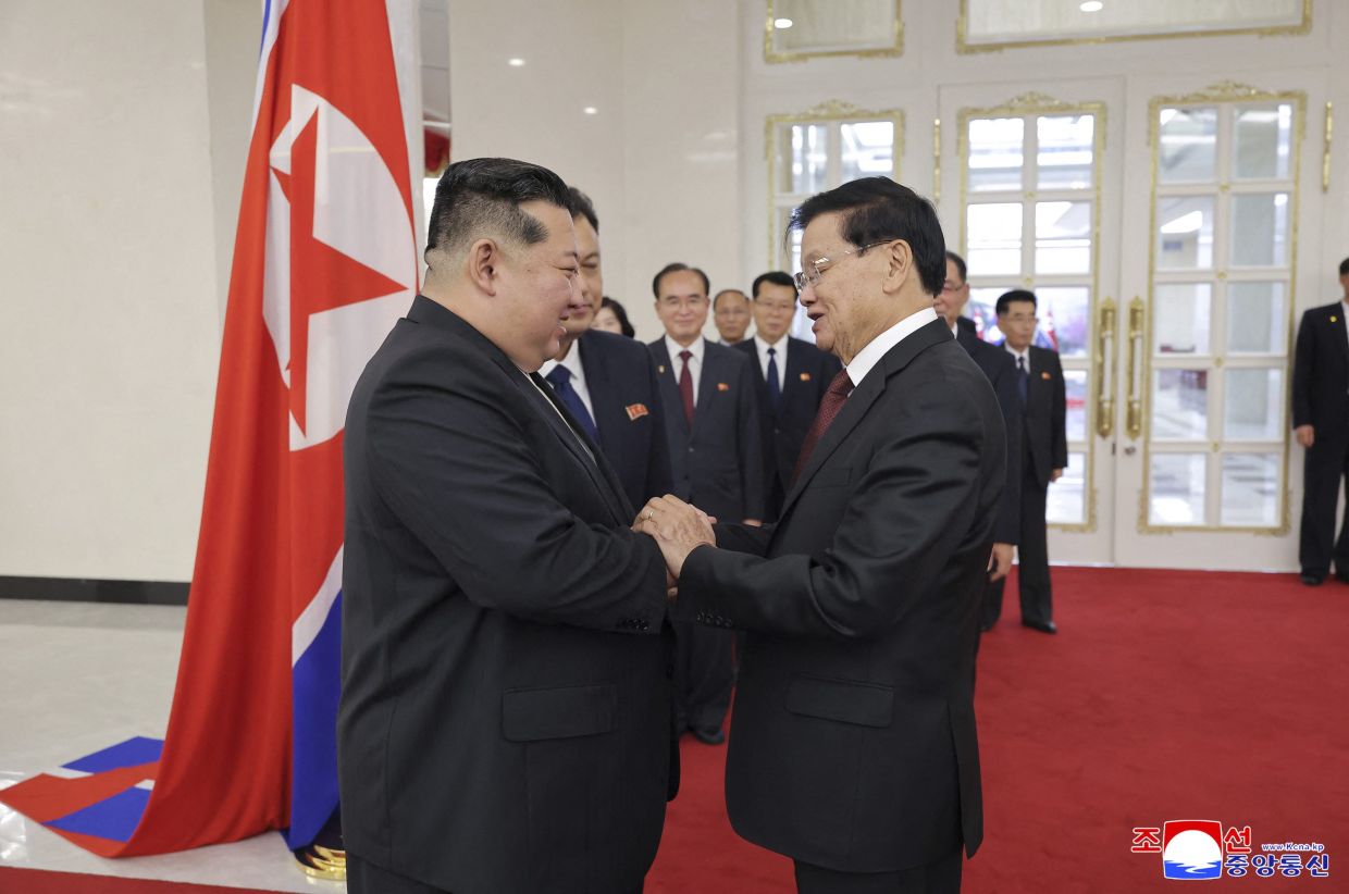 N. Korea's Kim Jong-un holds talks with Laotian President in Pyongyang: ...
