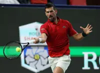 Tennis-Djokovic survives leg injury, heat exhaustion to beat Munar in Shanghai