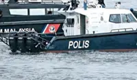 Suspect trafficking vessel collides with police boat in Gelang Patah
