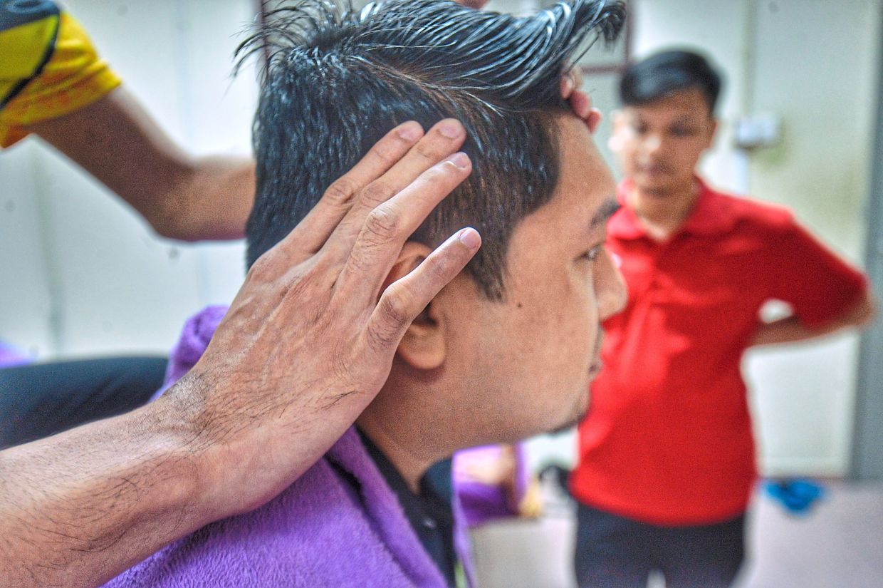 The Malaysian Association for the Blind equips the blind with practical skills like massage, enabling them to earn an income. Photo: The Star/Raja Faisal Hishan