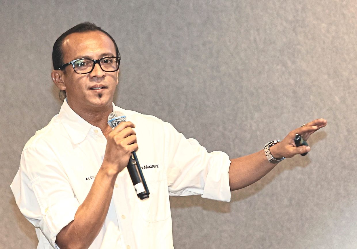 Ahmad Aldrie is concerned about the effects the revetment wall will have on the mangroves.