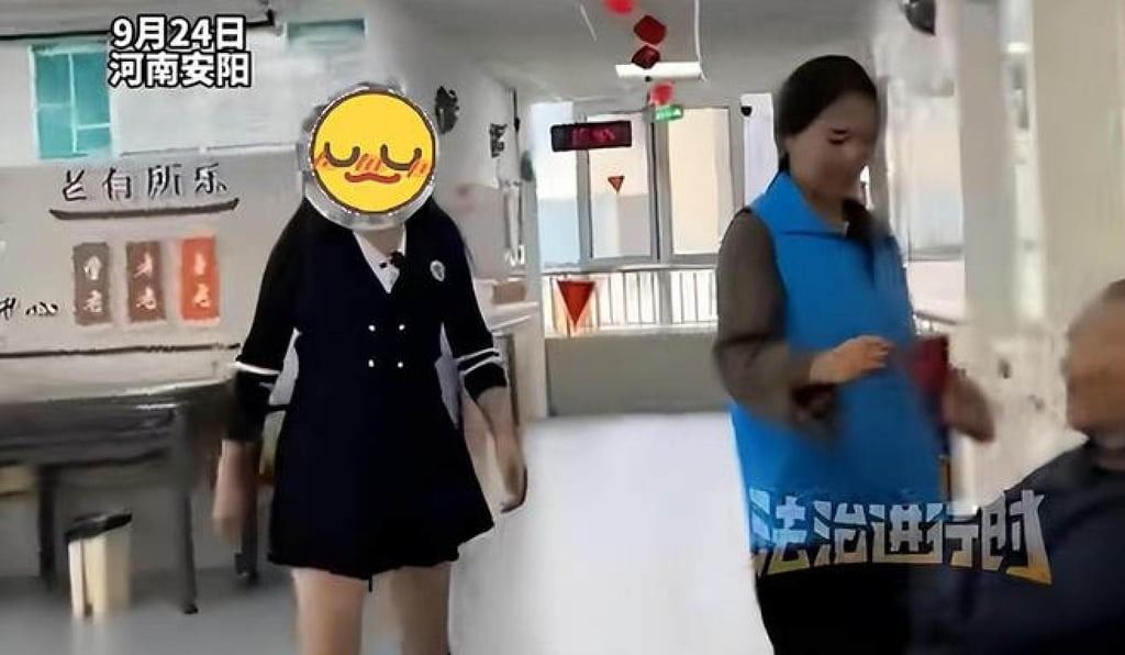One video depicts a dancer in a miniskirt performing, after which a formally dressed staff member approaches a male resident to administer his medication. -- Photo: Handout