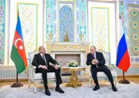Azerbaijan releases Russian journalist to house arrest after Putin-Aliyev meeting
