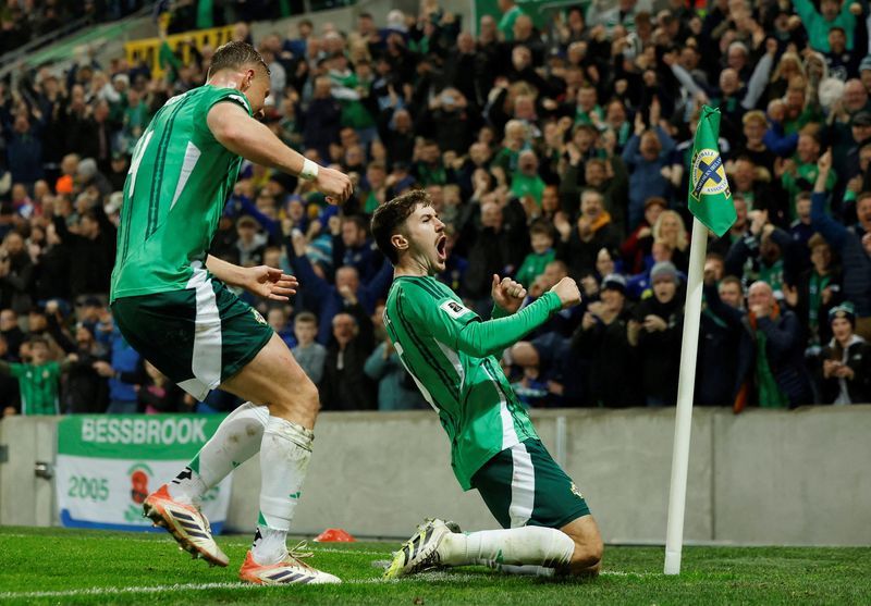 Soccer-Northern Ireland stun Slovakia in 2-0 win