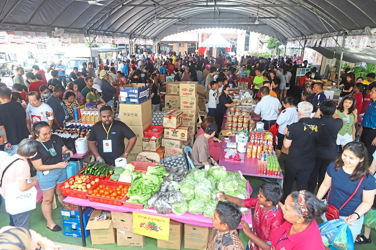 The fundraising food fair bustling with activity.