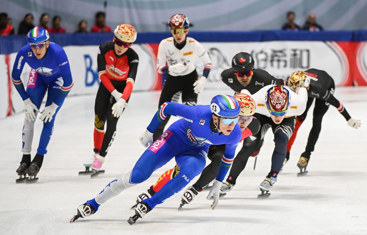Teams from Canada, Italy, China and South Korea compete in the final of the men's 5000m relay race at the ISU Short Track World Tour speedskating event in Montreal. - Graham Hughes/The Canadian Press via AP
