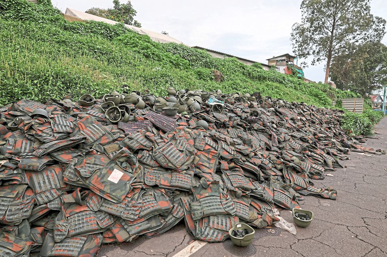 Abandoned rocket-propelled grenades that belonged to the Armed Forces of the Democratic Republic of Congo lying at Goma airport after the town was seized by the M23 rebels. — Reuters