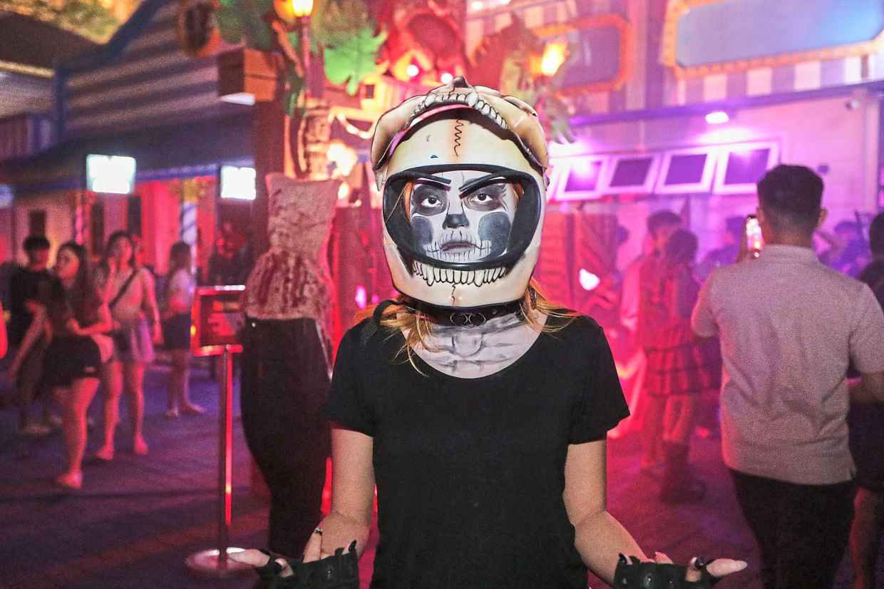 Grotesque creatures and nightmarish figures roamed the park as Sunway Lagoon transformed into a living carnival of fear for Nights of Fright 11. — YAP CHEE HONG/The Star
