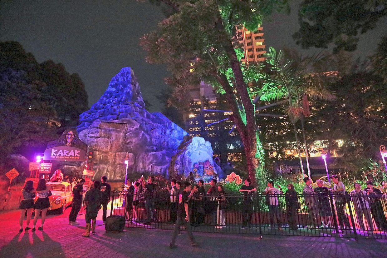 Visitors facing their fears (top left)and other characters relishing their scary roles at Sunway Lagoon. — Photos: YAP CHEE HONG/The Star Are you brave enough to face local scares in the form of the pocong (left) and the eerie Karak Highway (above) at Nights of Fright 11?