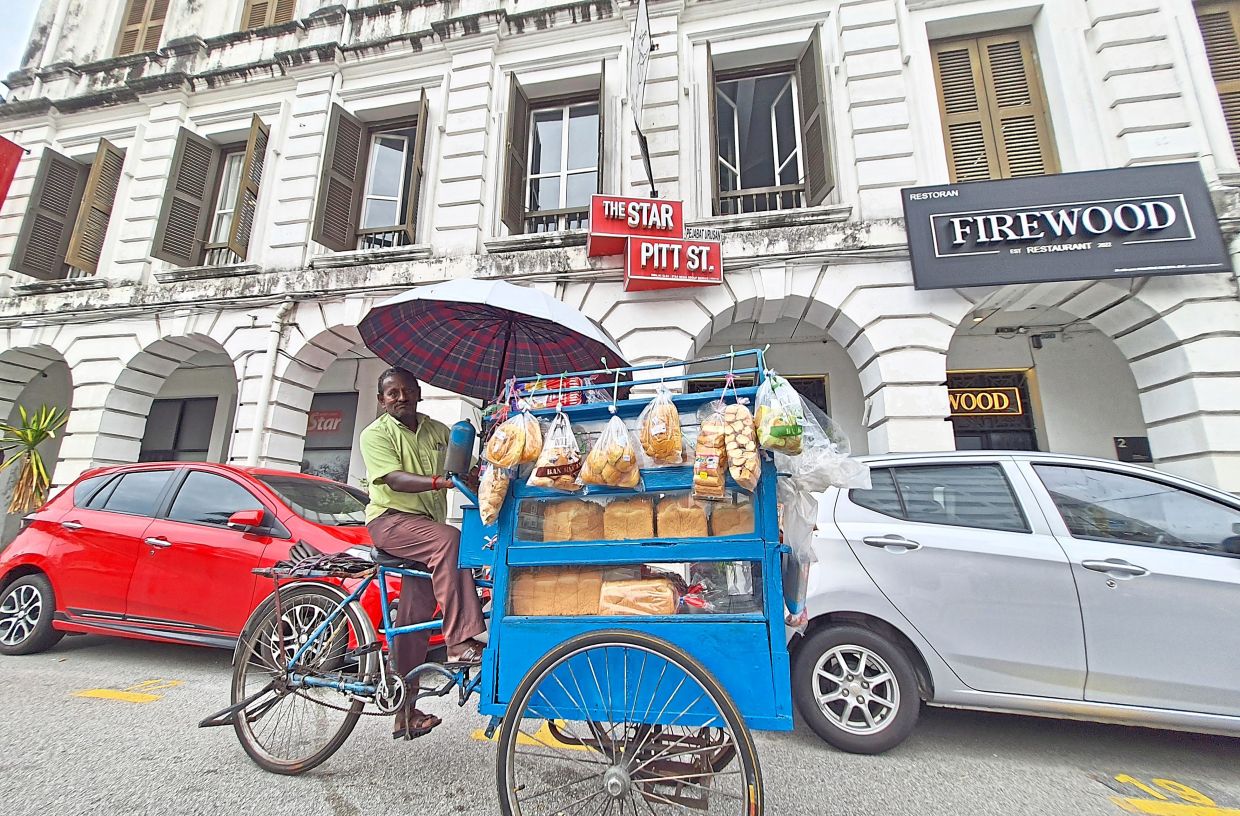 The ‘roti benggali’ sold by this travelling Roti Man carries a legacy started by south Indian bakers in Penang long ago. This iconic bread is now getting the recognition it deserves, having been named to the list of 10 Penang street food offerings nominated for heritage status. — Filepic