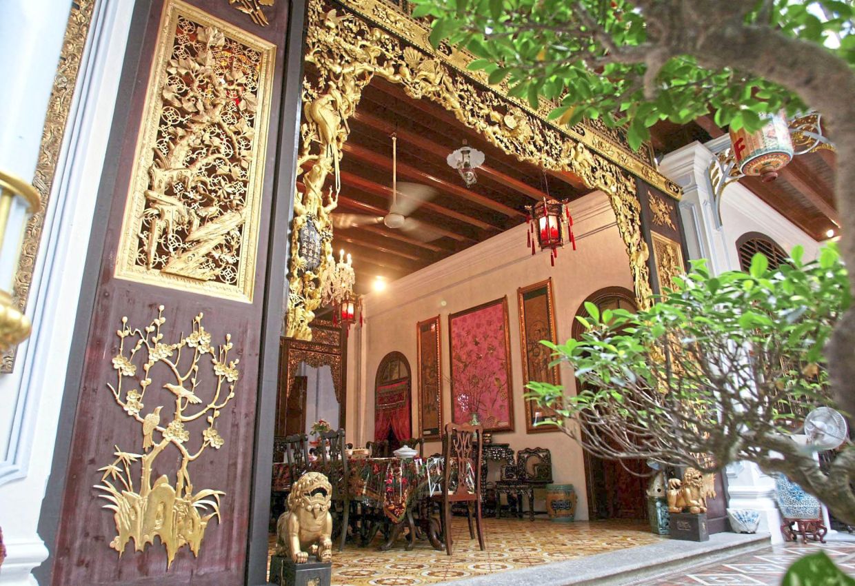 Baba Nyonya officially recognised | The Star 1 The gilded carvings near the air well inside the Pinang Peranakan Mansion in Church Street, the largest Baba Nyonya Museum in the country.