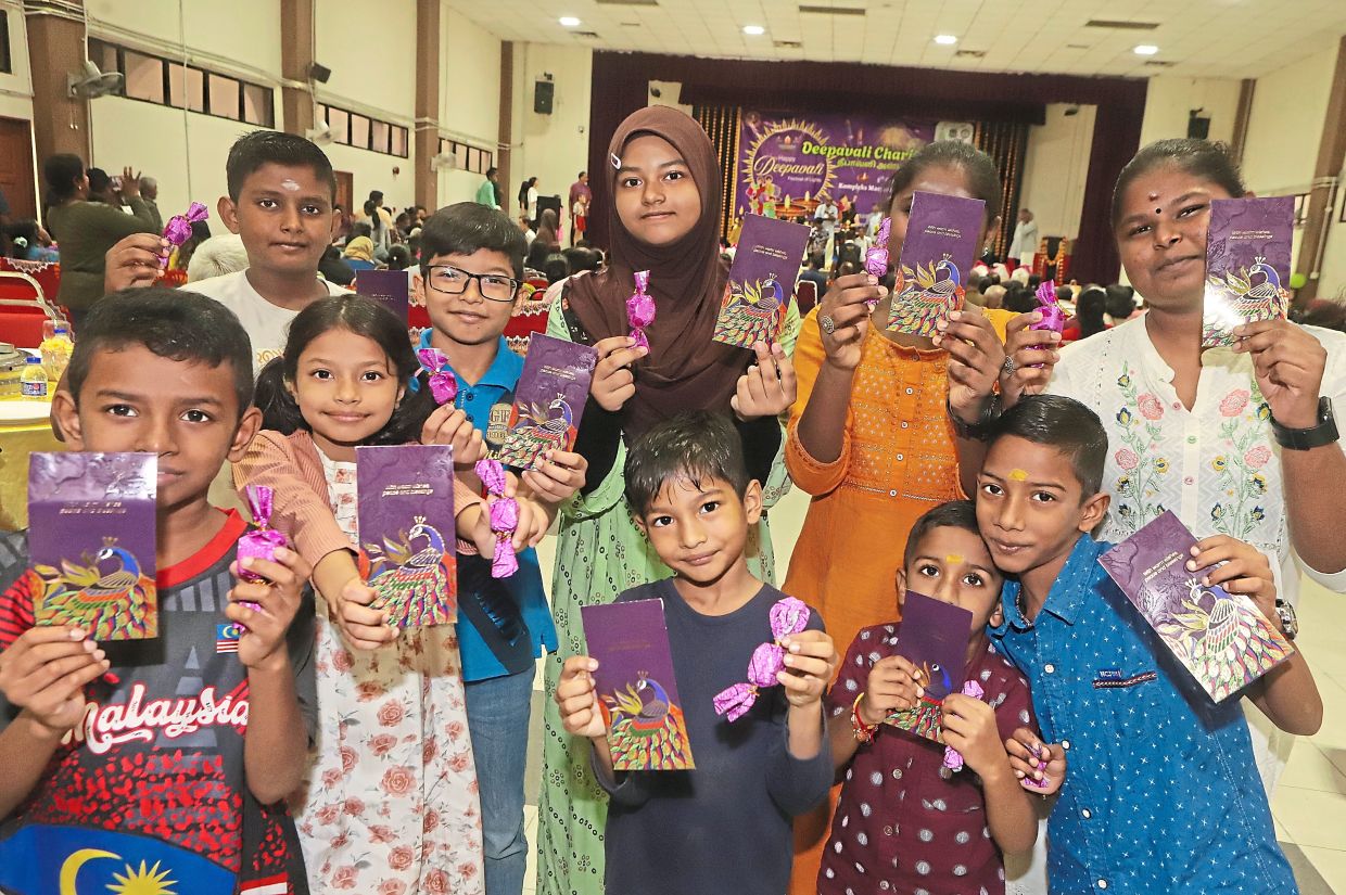Smiling faces of children who received Deepavali cash at PHA’s Deepavali charity event.
